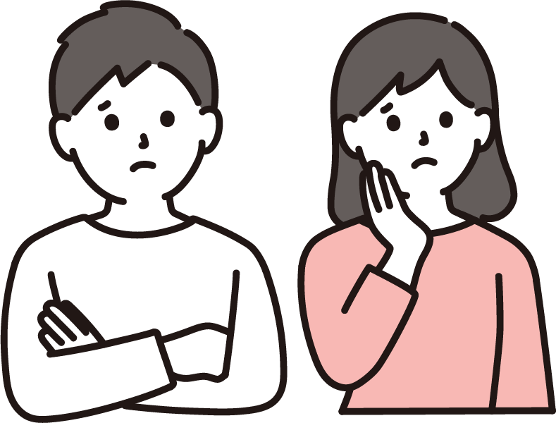 悩んだ表情をしている夫婦